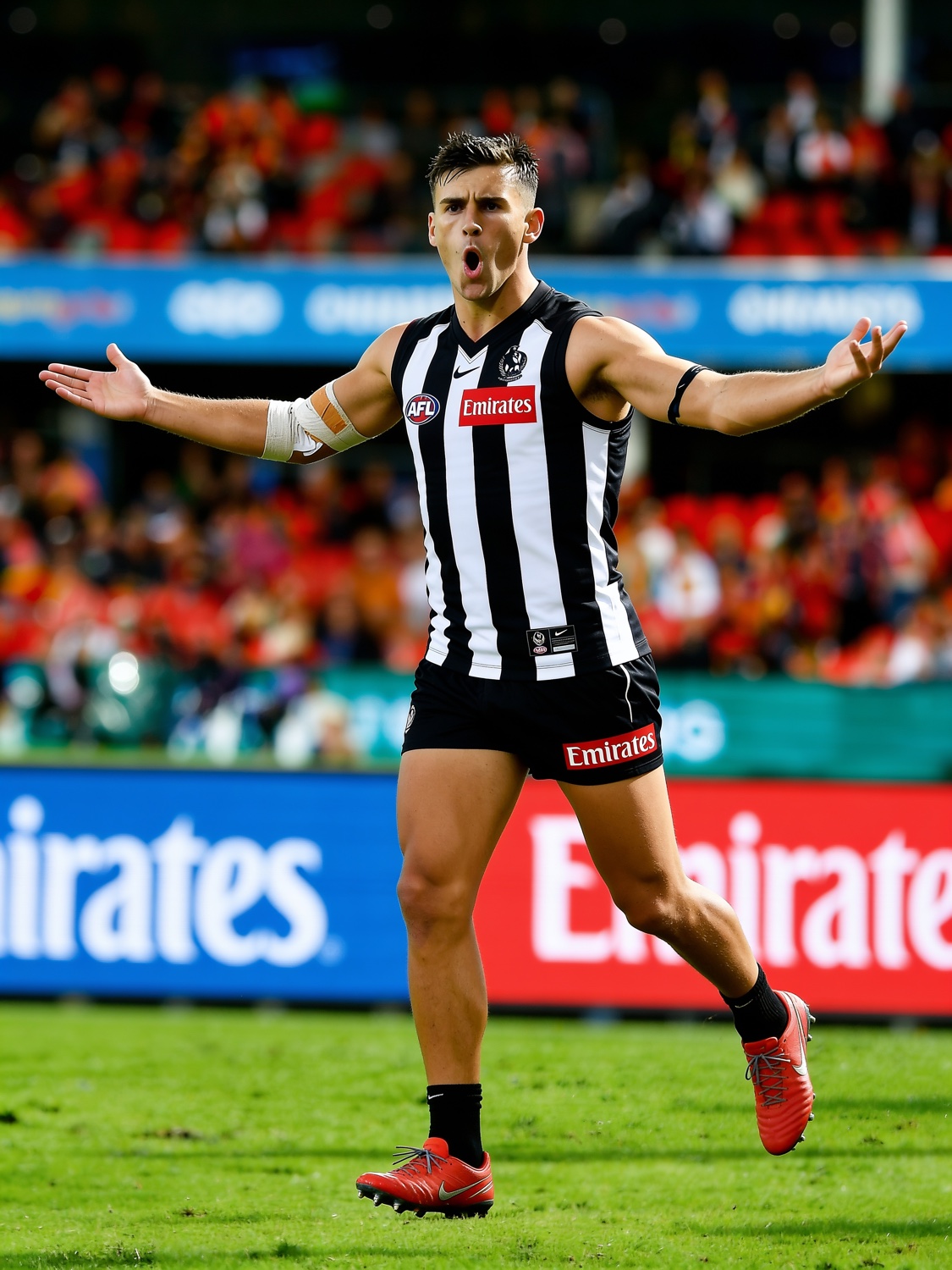 Nick Daicos celebrating for Collingwood